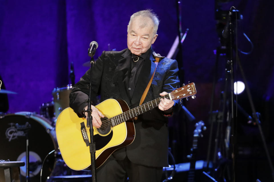 FILE — In this Sept. 11, 2019, file photo, John Prine performs at the Americana Honors & Awards show in Nashville, Tenn. The icon earned two posthumous Grammy nominations, including best American Roots performance and best American Roots song for “I Remember Everything." Prine died April 7, 2020, from complications of the coronavirus. He was 73. (AP Photo/Wade Payne, File)