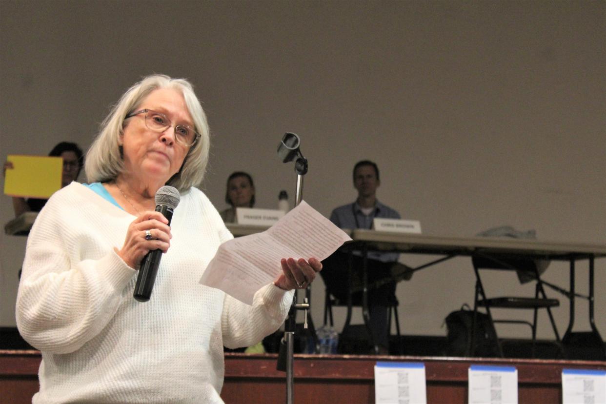 Pondera County property owner Jody Field defends the proposed use of two played out oil and gas wells on her land for the injection of biofuel wastewater during a meeting in Conrad on Wednesday