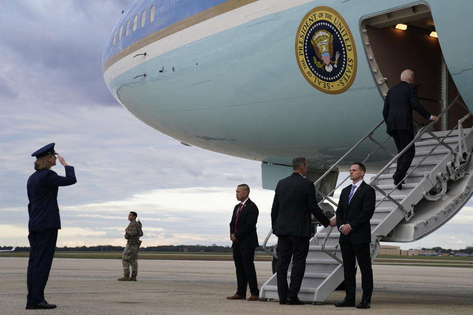 President Joe Biden boards Air Force One for a trip to Israel, Tuesday, Oct. 17, 2023, at Andrews Air Force Base, Md. (AP Photo/Evan Vucci)