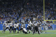 Baltimore Ravens kicker Justin Tucker (9) kicks a 66-yard field goal in the second half of an NFL football game against the Detroit Lions in Detroit, Sunday, Sept. 26, 2021. Baltimore won 19-17. (AP Photo/Tony Ding)