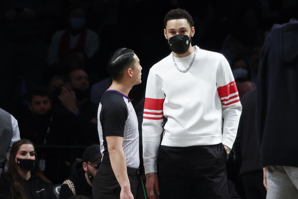 Brooklyn Nets' Ben Simmons, right, looks on during the second half of an NBA basketball game against the Sacramento Kings, Monday, Feb. 14, 2022, in New York. (AP Photo/Corey Sipkin)