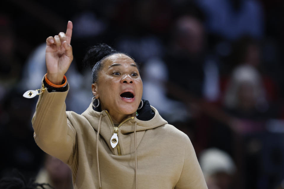 South Carolina head coach Dawn Staley directs her team against North Carolina during the second half of a second-round college basketball game in the women's NCAA Tournament in Columbia, S.C., Sunday, March 24, 2024. (AP Photo/Nell Redmond)
