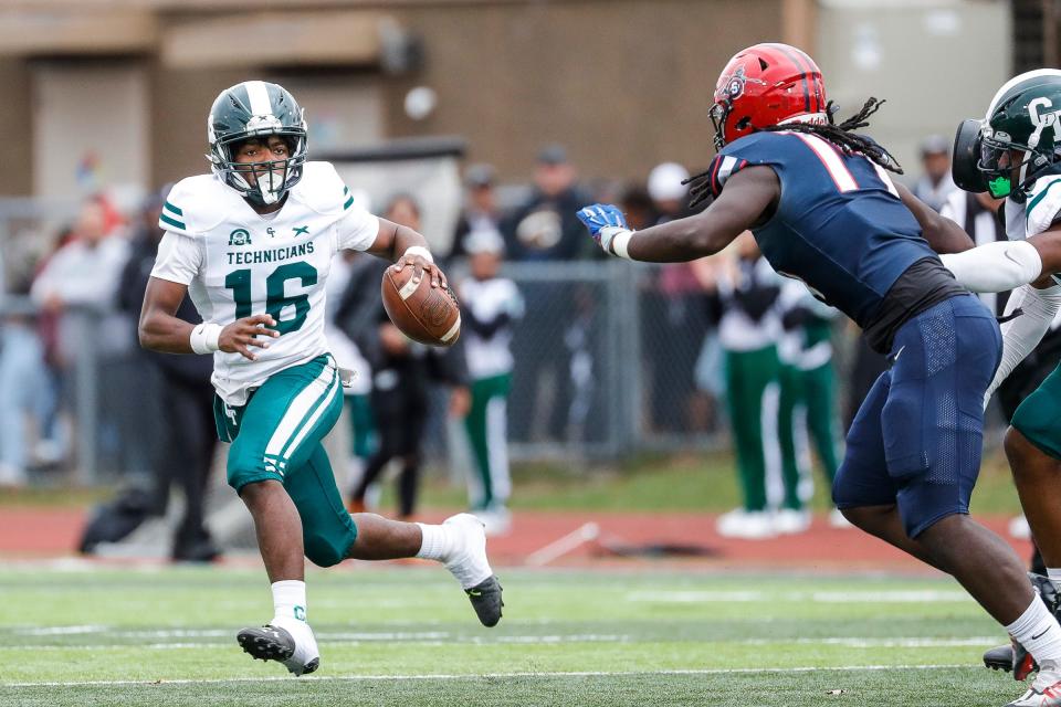 Cass Tech quarterback Leeshaun Mumpfield (16) looks to pass against Southfield A&T during the first half of a district championship game Saturday, Nov. 5, 2022 at Southfield A&T High School in Southfield.