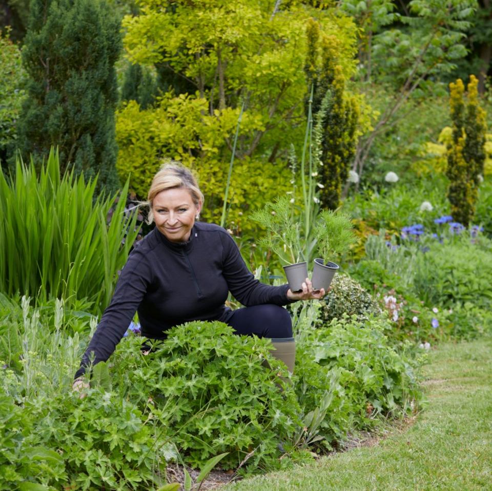 Anya Lautenbach in her garden in Marlow, Buckinghamshire