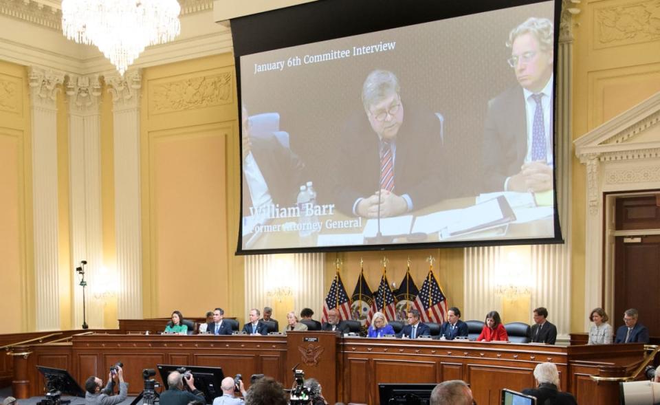 <div class="inline-image__caption"><p>A video image of then Attorney General William Barr is seen on a screen during the hearing.</p></div> <div class="inline-image__credit">Mandel Ngan/AFP via Getty</div>