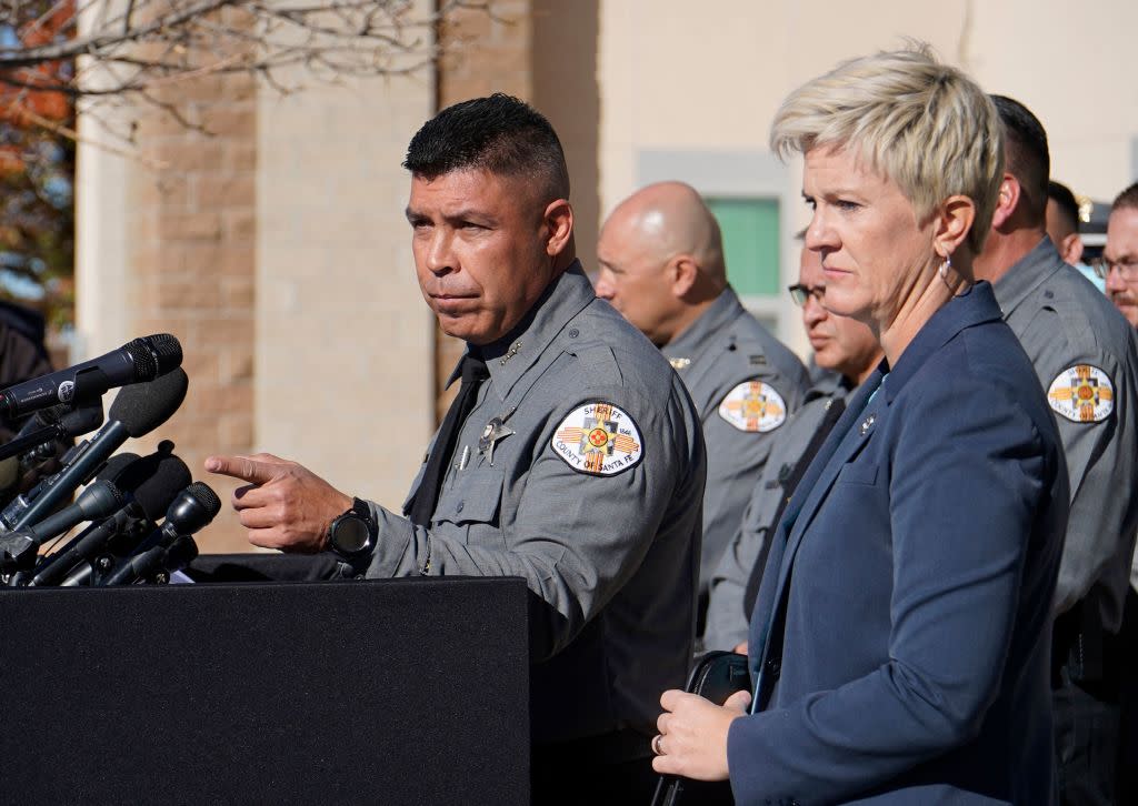 Santa Fe County Sheriff Adan Mendoza and District Attorney Mary Carmack-Altwies speak to the press about the shooting on Oct. 27. (Photo: NICK LAYMAN/AFP via Getty Images)