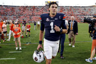 Auburn quarterback Payton Thorne runs off the field after the second half an NCAA college football game against Mississippi State, Saturday, Oct. 28, 2023, in Auburn, Ala. (AP Photo/Butch Dill)