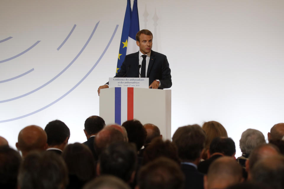 French President Emmanuel Macron delivers a speech during the annual French ambassadors' conference at the Elysee Palace in Paris, France, Monday, Aug. 27, 2018. (Philippe Wojazer/Pool Photo via AP)