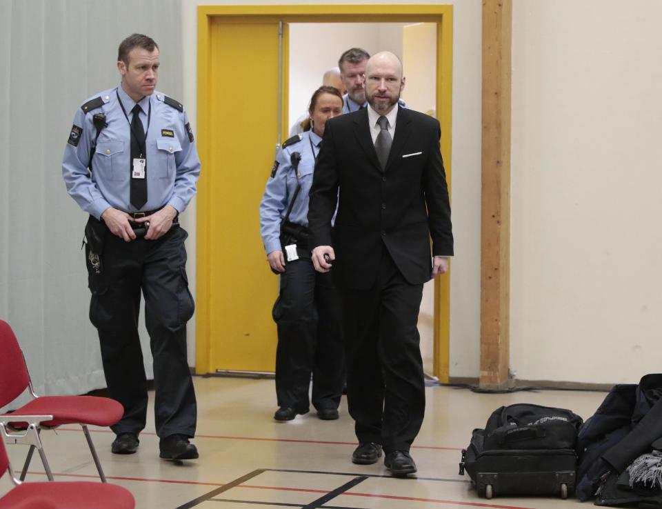 Anders Behring Breivik arrives for the last day of his appeal case in Borgarting Court of Appeal at Telemark prison in Skien, Norway, Wednesday, Jan. 18, 2017. Norway has defended the prison conditions under which mass murderer Anders Behring Breivik is being held. The state attorney presented its closing statement in an appeals trial against a lower court ruling that found that Breivik's isolation in prison violated his human rights. (Lise Aaserud/NTB Scanpix via AP)