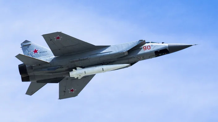 A Russian Air Force MiG-31K jet carries a high-precision hypersonic aero-ballistic missile.