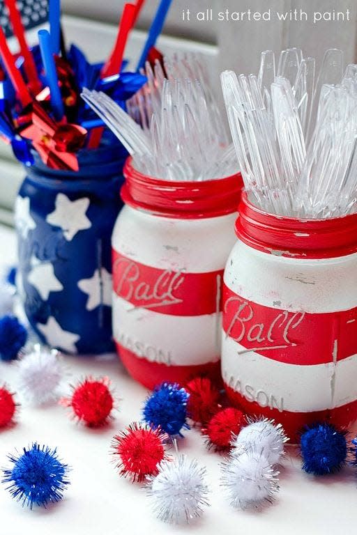 <p>Acrylic paint will transform your mason jars into pieces of patriotic perfection (as well as the perfect utensil holders). </p><p><em><strong>Get the tutorial from <a href="http://www.itallstartedwithpaint.com/red-white-blue-mason-jars/" rel="nofollow noopener" target="_blank" data-ylk="slk:It All Started With Paint;elm:context_link;itc:0;sec:content-canvas" class="link ">It All Started With Paint</a>.</strong></em></p>