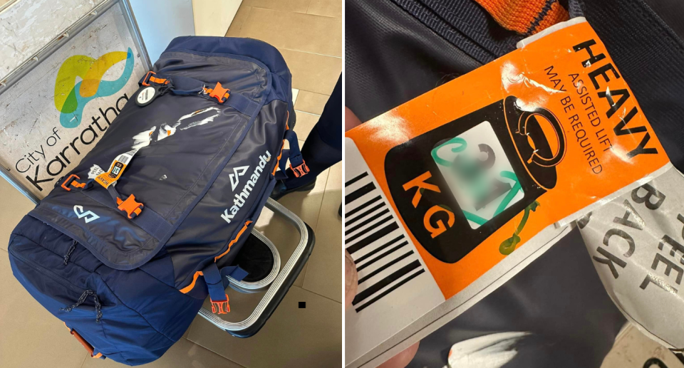 Image of the Kathmandu bag with the Qantas 'heavy tag' wrapped around the handle stating it is 31-kilograms. The orange tag has 'c**t' written on it in green marker.