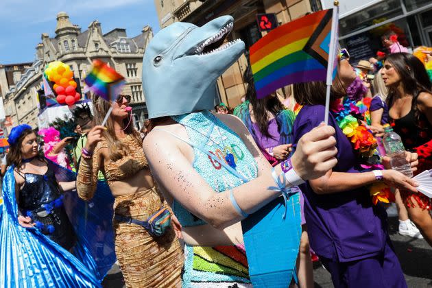 BRIGHTON, ENGLAND - AUGUST 06: Festival goers participate in the Pride LGBTQ+ Community Parade – ‘Love, Protest & Unity’ during the Brighton Pride on August 06, 2022 in Brighton, England. (Photo by Tristan Fewings/Getty Images) (Photo: Tristan Fewings via Getty Images)