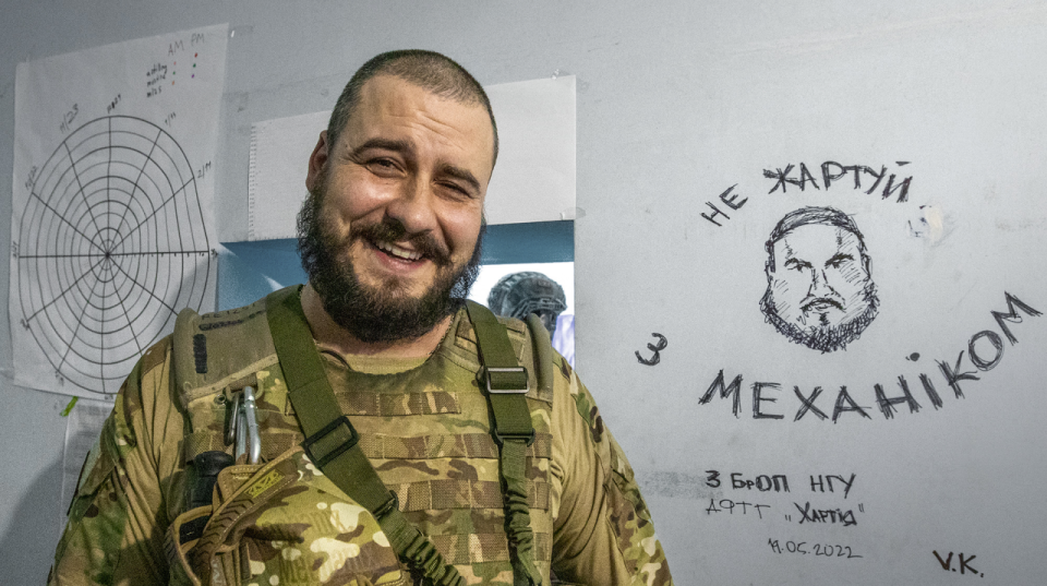 "Mechanic", commander of a company tactical group of the National Guard, next to his portrait <span class="copyright">Oleksandr Medvedev</span>