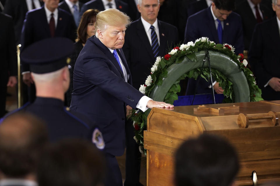 <p>President Donald Trump touches the casket containing the late Rev. Billy Graham as it lies in honor in the U.S. Capitol Rotunda in Washington, Feb. 28, 2018. (Photo: Chip Somodevilla/Pool/Reuters) </p>