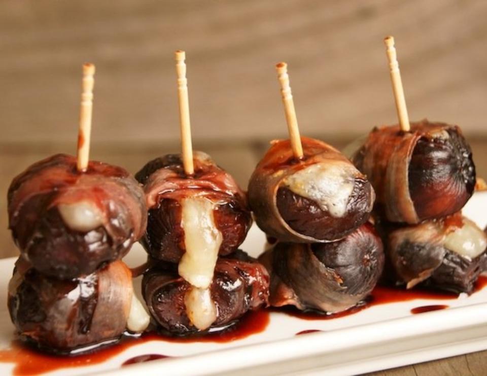 <p>Cooking on the Weekends</p><p>The perfect sweet, salty and savory bites.</p><p><strong>Get the recipe: <a href="https://cookingontheweekends.com/port-glazed-manchego-figs-and-prosciutto/" rel="nofollow noopener" target="_blank" data-ylk="slk:Port Glazed Manchego Figs and Prosciutto;elm:context_link;itc:0;sec:content-canvas" class="link ">Port Glazed Manchego Figs and Prosciutto</a></strong></p>