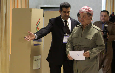 Iraqi Kurdish President Masoud Barzani casts his vote during Kurds independence referendum in Erbil, Iraq September 25, 2017. REUTERS/Azad Lashkari