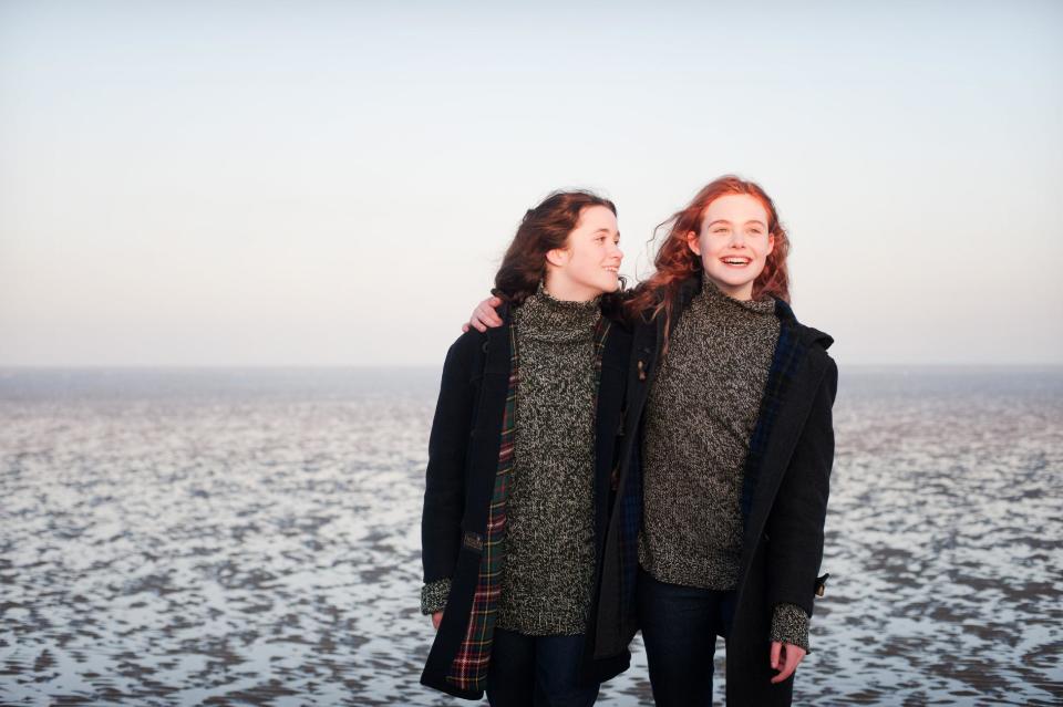 This publicity photo released by A24 Films shows Alice Englert, left, as Rosa and Elle Fanning as Ginger in a scene from the film, "Ginger and Rosa," directed by Sally Potter. (AP Photo/A24 Film, Nicola Dove)