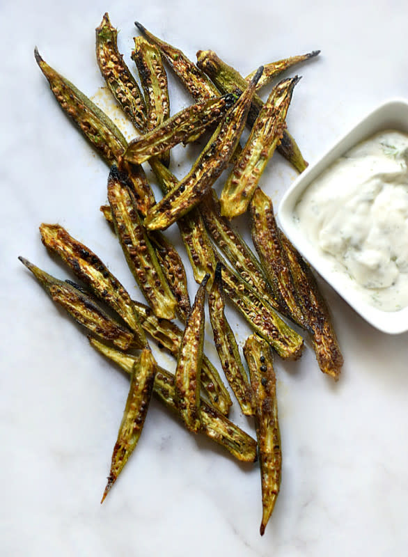 <p>My Pretty Brown Fit</p><p>Crispy Oven Okra is roasted to perfection with a flavorful crunch. Served with a delicious, Lemon-Dill and Garlic Aioli and will easily become a family favorite!</p><p><strong>Get the Recipe:</strong><a href="https://www.myprettybrownfit.com/2020/10/crispy-oven-okra-with-lemon-dill-and-garlic-aioli/" rel="nofollow noopener" target="_blank" data-ylk="slk:Crispy Oven Okra with Lemon Dill and Garlic Aoli;elm:context_link;itc:0;sec:content-canvas" class="link rapid-noclick-resp"> <strong>Crispy Oven Okra with Lemon Dill and Garlic Aoli</strong></a></p>