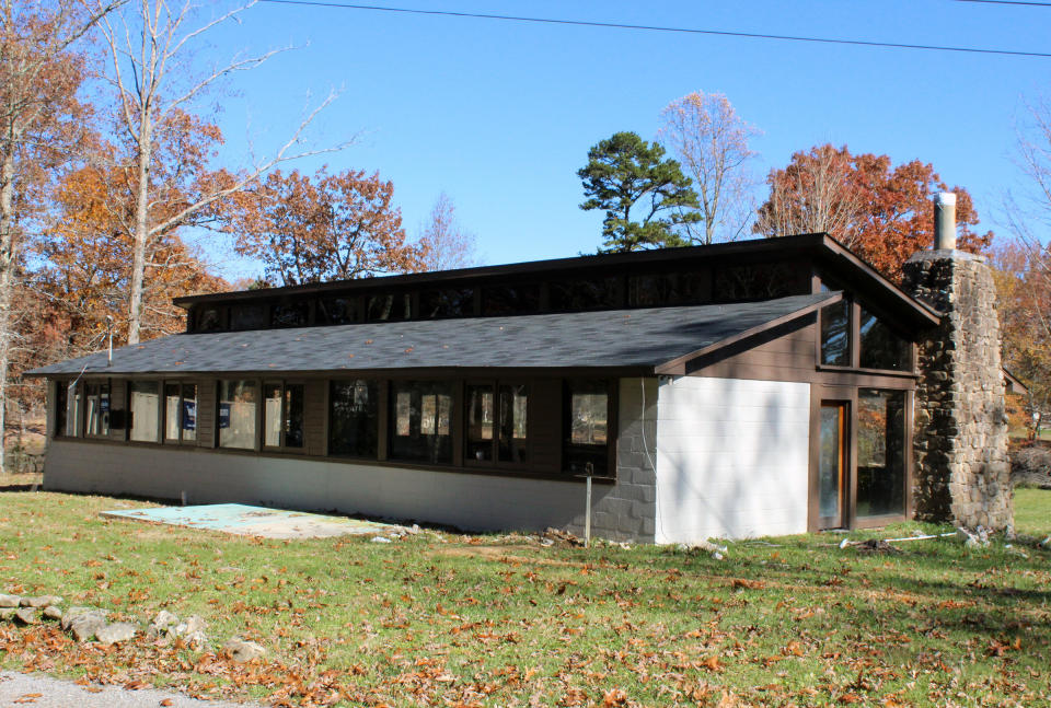 This 2021 photo shows library building of Highlander Folk School in New Market, Tenn. A fight is brewing in Tennessee over the legacy of a legendary social justice school that counts Rosa Parks among its alumni and Eleanor Roosevelt among its supporters. One of the few buildings left is the Highlander library. Preservationists restored the building and want it listed on the National Register of Historic Places. But the Highlander Research and Education Center never stopped working from a new location. (David Currey via AP)