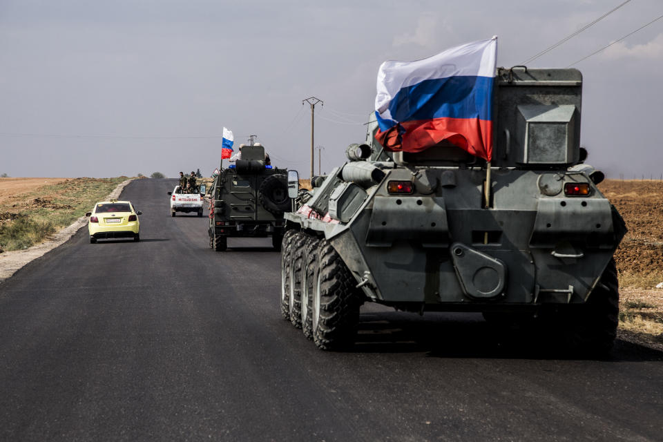 Russian military patrols near Syrian and Turkish border in north Syria, Friday. Oct. 25, 2019. (AP Photo/Baderkhan Ahmad)