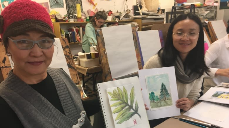 A brush with painting brings colour to newcomers' lives