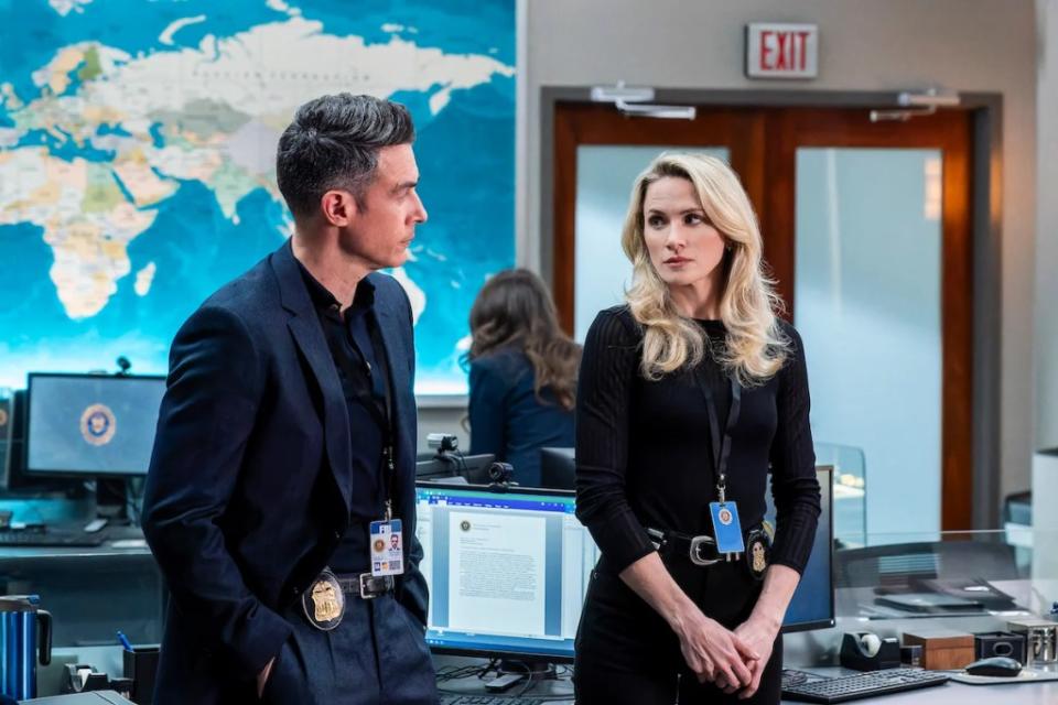 Special Agent Stuart Scola (John Boyd) and Special Agent Nina Chase (Shantel VanSanten) are back in the JOC after her reassignment to the Fugitive Task Force. (Credit: Bennett Raglin/CBS)