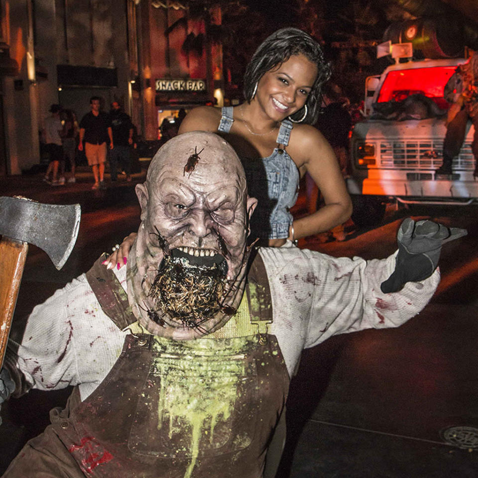 See what we mean?! Singer and reality star Christina Milian was more excited than terrified to meet a new ax-wielding friend. (Courtesy of NBC Universal)