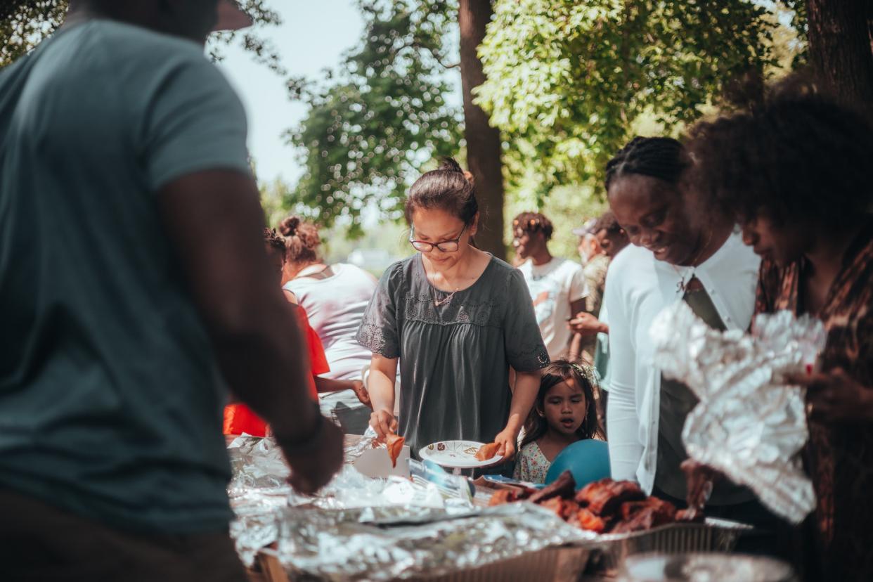  Image of people at a barbecue 