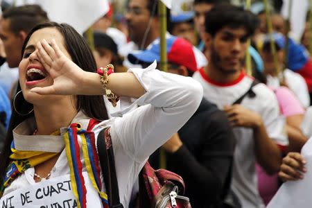 Opposition students march against Venezuelan President Nicolas Maduro's government in Caracas February 12, 2015. REUTERS/Jorge Silva