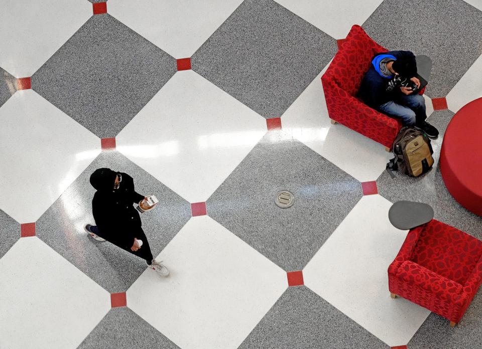 The floor of the Ohio Union on The Ohio State University campus looks like a chess board as a student moves across it on Jan. 13.