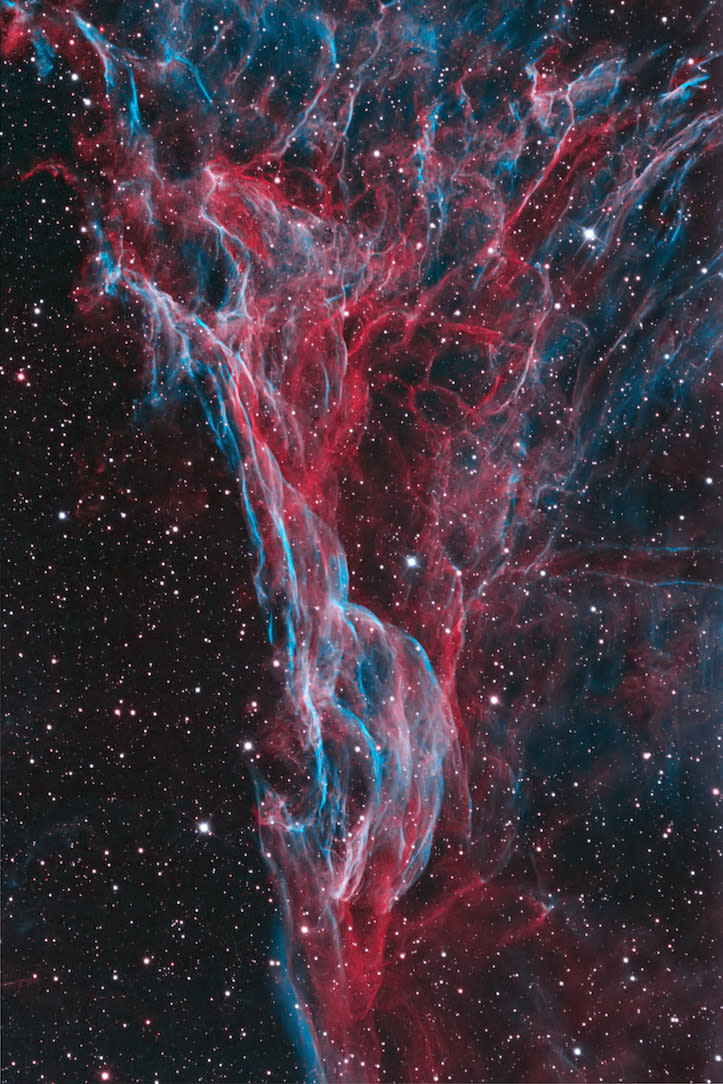 <p>The tangled filaments of Pickering’s Triangle - a supernova remnant - trail through the night sky in megawatt colour. (Bob Franke)</p>