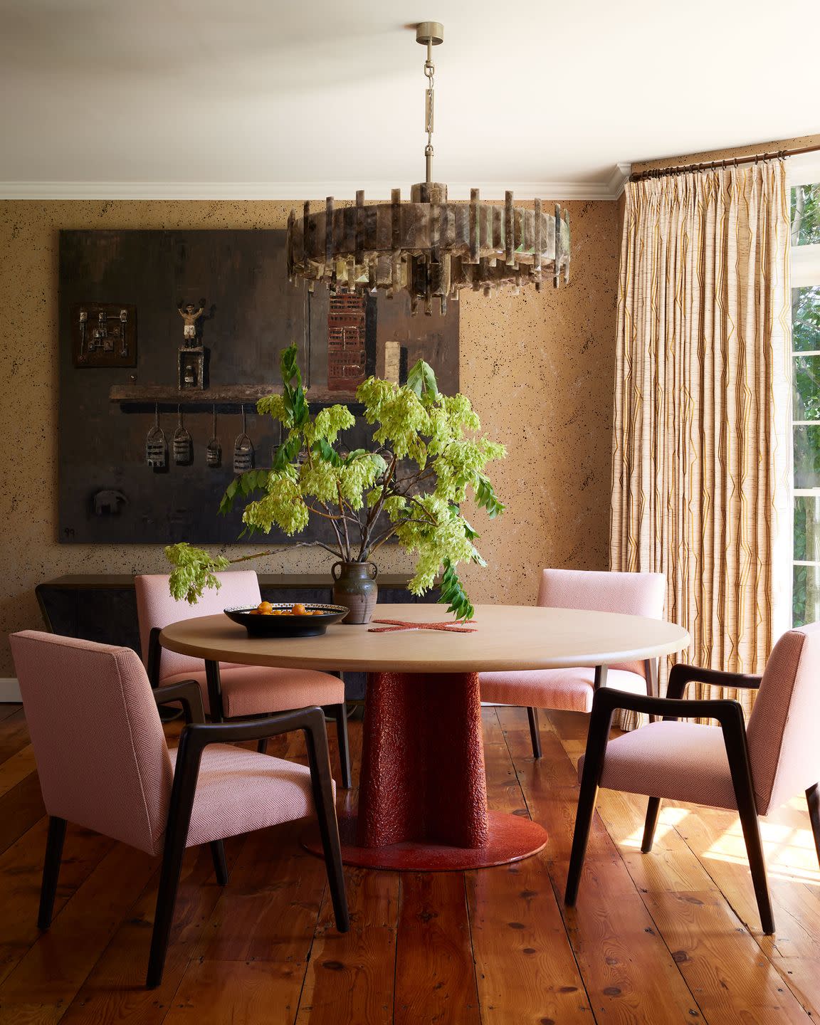 a dining room table with chairs