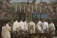 Pope Francis leads a mass where 32 babies were baptized in the Sistine Chapel at the Vatican January 12, 2014, in this handout courtesy of Osservatore Romano. REUTERS/Osservatore Romano/Handout via Reuters (VATICAN - Tags: RELIGION) ATTENTION EDITORS - THIS IMAGE WAS PROVIDED BY A THIRD PARTY. FOR EDITORIAL USE ONLY. NOT FOR SALE FOR MARKETING OR ADVERTISING. THIS PICTURE IS DISTRIBUTED EXACTLY AS RECEIVED BY REUTERS, AS A SERVICE TO CLIENTS. NO SALES. NO ARCHIVES