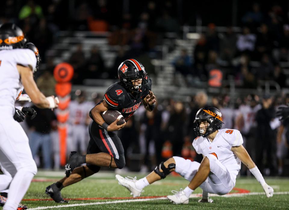 North Salem's Jamahl Wilson (4) carries the ball during the game against Sprague on Friday, Oct. 13, 2023 in Salem, Ore.