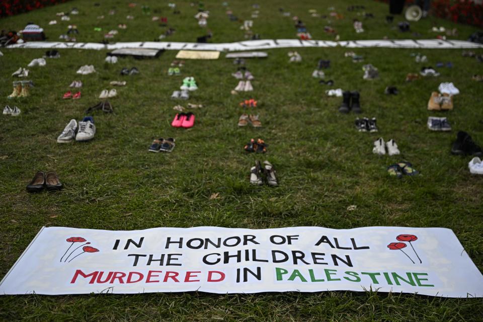 Pro-Palestinian activists hold a remembrance vigil outside the White House in Washington DC (Anadolu via Getty Images)