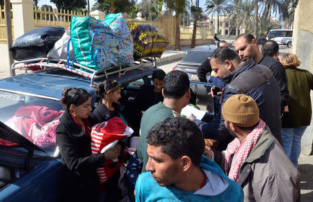 Christian families who left from Al-Arish in the North Sinai Governorate after the escalation of a campaign targeting Christians by Islamic State militants last week, arrive at the Evangelical Church in Ismailia, Egypt February 24, 2017. REUTERS/Ahmed Aboulenein