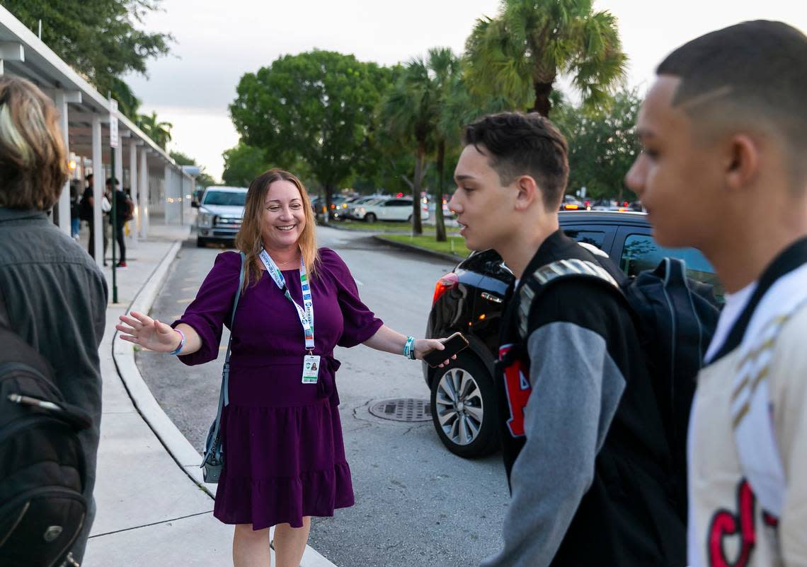 Broward County School Board member Lori Alhadeff, left, greets students as they arrive for the first day of school at Coral Glades High School on Tuesday, Aug. 16, 2022, in Coral Springs, Fla. On Tuesday, Aug. 30, the new Broward School Board named Alhadeff as the board’s vice chair.