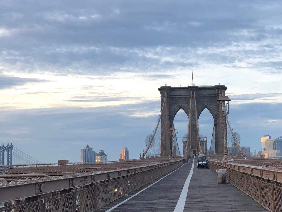 The Brooklyn Bridge at sunrise.