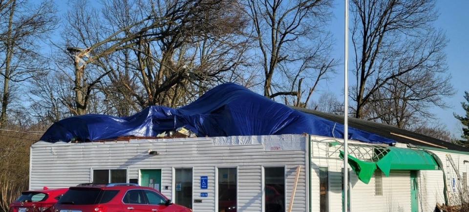 Straight line winds took off half of the roof of the Madison Township Hall and damaged the fire station on Expressview Drive early Saturday morning.