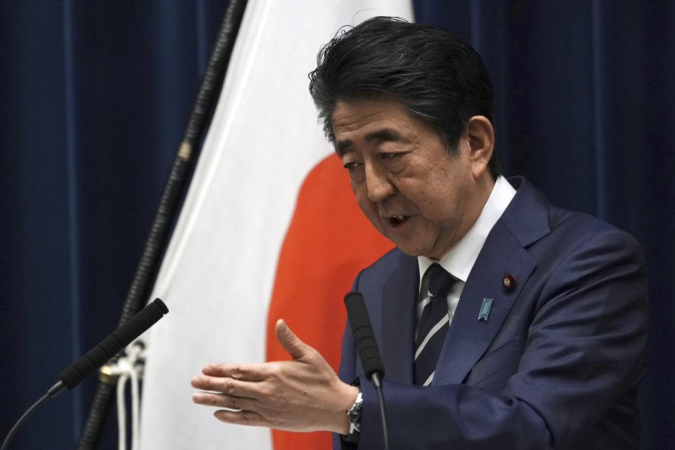 Japanese Prime Minister Shinzo Abe delivers his speech at the Prime Minister's office in Tokyo Saturday, Feb. 29, 2020. During the speech Abe said that his government will create another emergency package totaling over 270 billion yen ($2.5 billion) from reserve funds to prevent the spread of the new coronavirus, local media said. (AP Photo/Eugene Hoshiko)