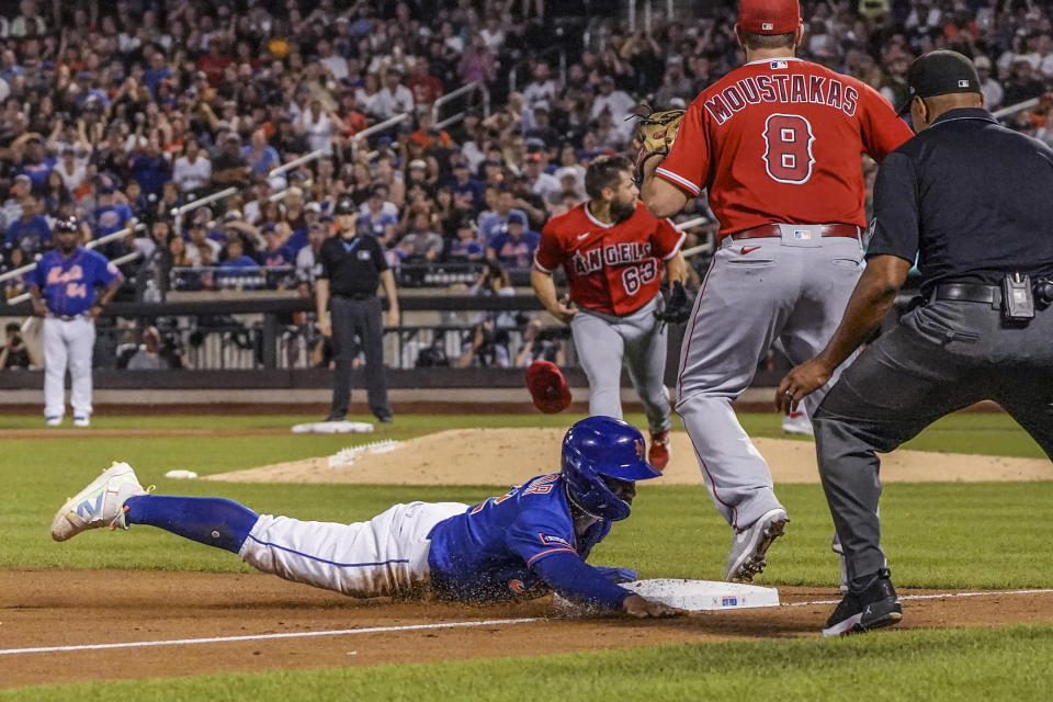 New York Mets Francisco Lindor steals third base during fourth inning of the team's baseball game against the Los Angeles Angels, Saturday, Aug. 26, 2023, in New York. (AP Photo/Bebeto Matthews)