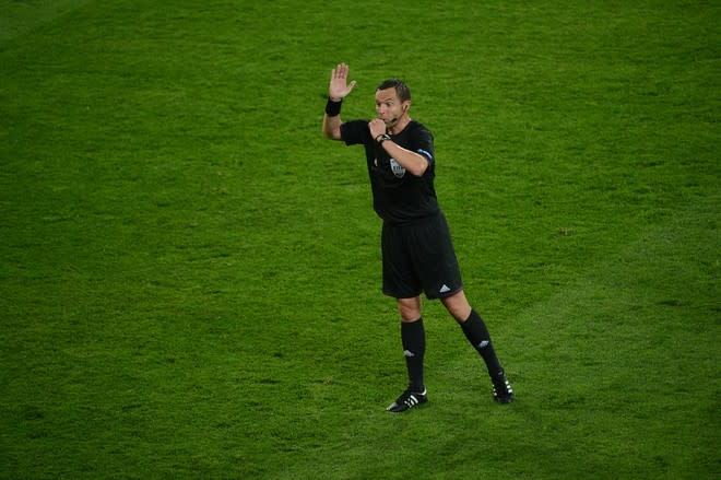 French referee Stephane Lannoy whistles during the Euro 2012 championships football match Germany vs Portugal on June 9, 2012 at the Arena Lviv. AFP PHOTO / ANNE-CHRISTINE POUJOULATANNE-CHRISTINE POUJOULAT/AFP/GettyImages