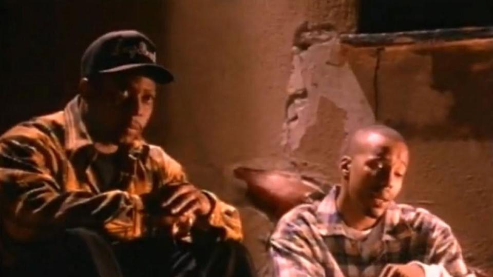 Nate Dogg and Warren G in the video for "Regulate."