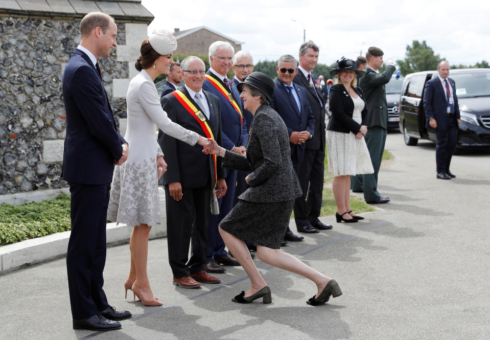 The British Prime Minister did they same curtsey when meeting Kate Middleton in Belgium. Photo: Getty