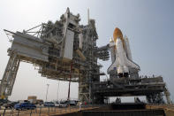 FILE - In this Friday, June 17, 2011 file photo, space shuttle Atlantis is mounted on Pad 39A at the Kennedy Space Center in Cape Canaveral, Fla. Dormant for nearly six years, Launch Complex 39A at NASA’s Kennedy Space Center should see its first commercial flight on Feb. 18, 2017. A SpaceX Falcon 9 rocket will use the pad to hoist supplies for the International Space Station. (AP Photo/John Raoux)