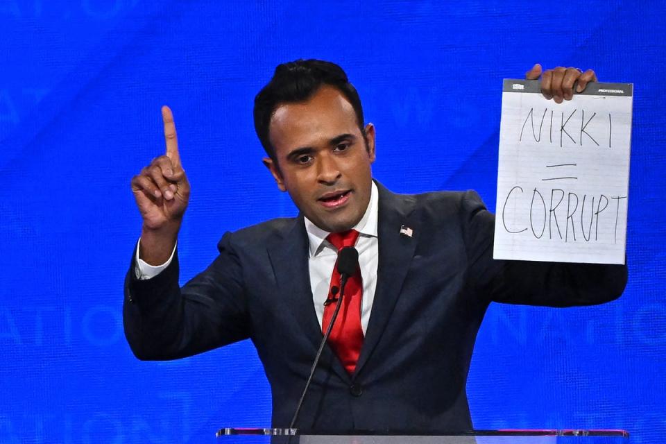 Entrepreneur Vivek Ramaswamy attack Nikki Haley at the fourth Republican presidential primary debate in Alabama in December (AFP via Getty Images)