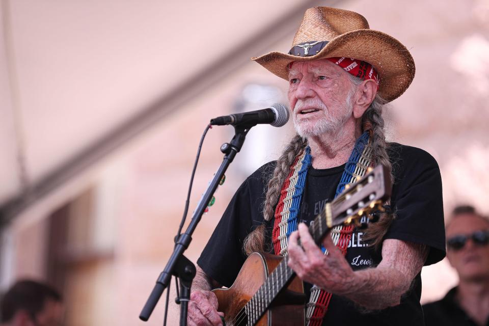 Willie Nelson performs during a gathering outside the Capitol in Austin, Texas, during a voting rights rally on July 31, 2021.