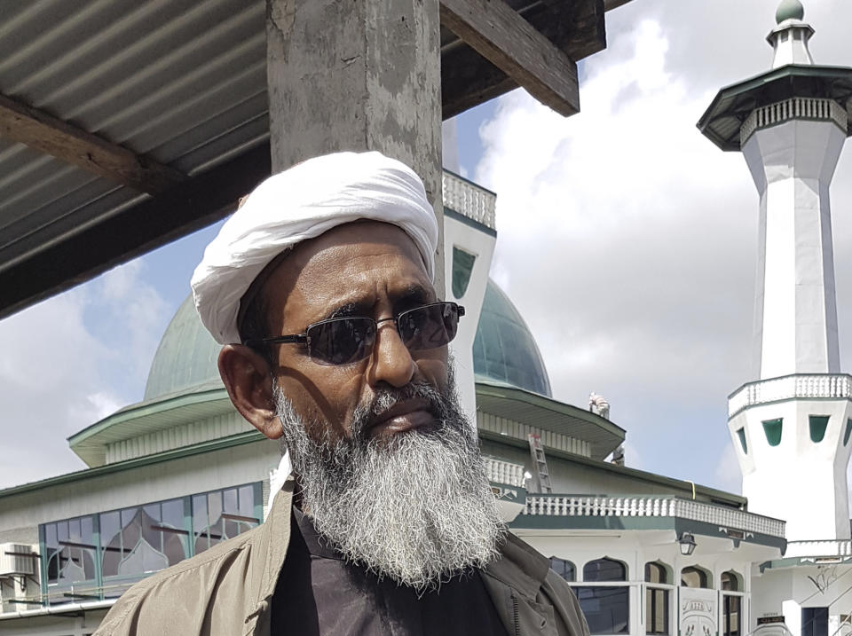 In this Feb. 9, 2017 photo, Umar Abdullah, head of the Islamic Front in southern Trinidad, speaks during an interview in Two Princesses Town, Trinidad and Tobago. Umar Abdullah said he has actively discouraged members from traveling to Syria to fight. He said he knew several young men who had become IS fighters, although he declined to provide specifics. (AP Photo/Ricardo Nunez)