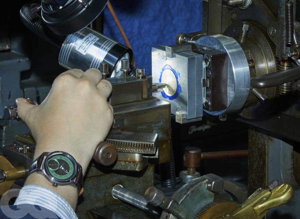 Michael Rose (and his custom emerald Infinity model) engraving a dial with an engine turning machine.